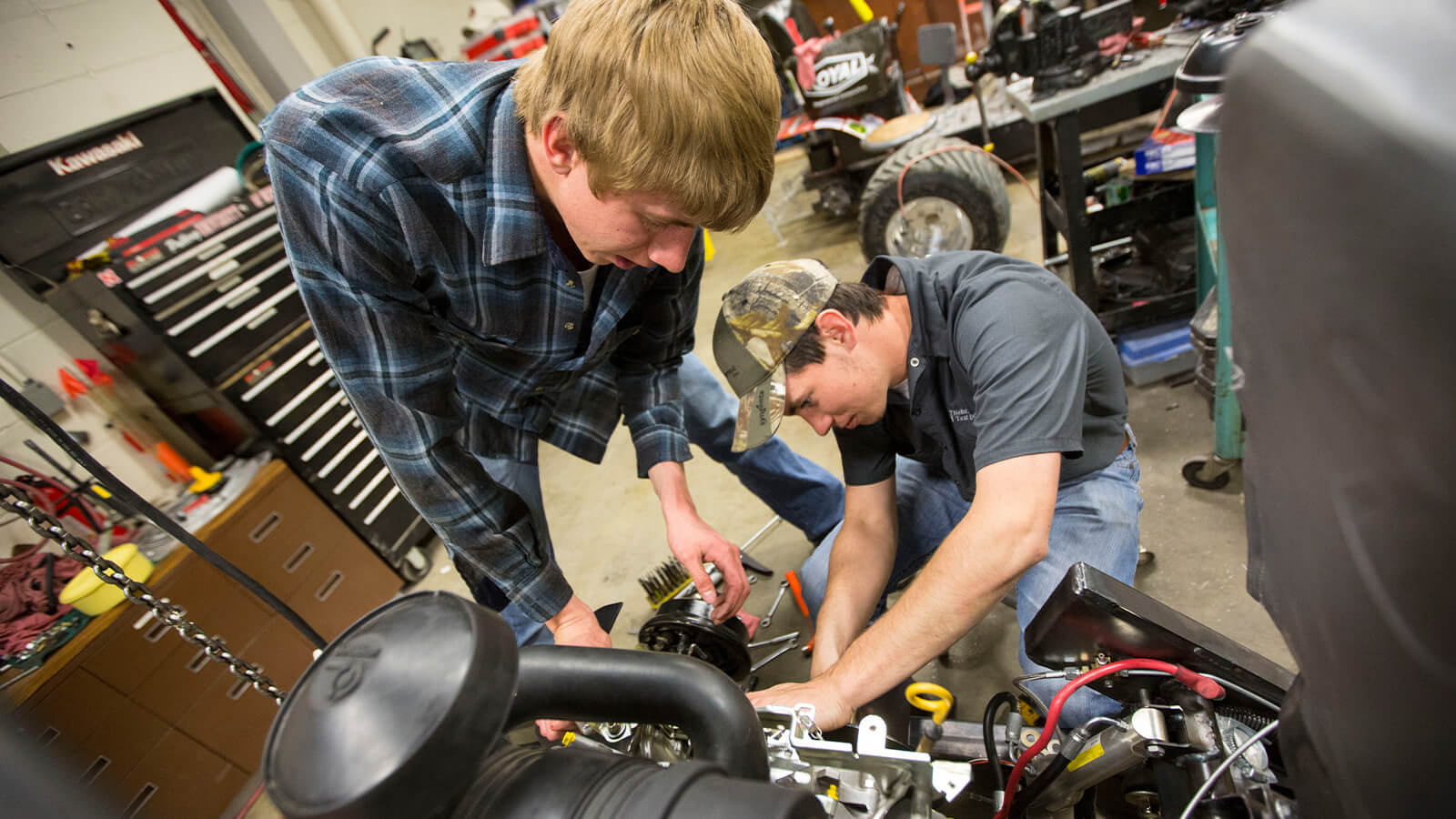 Students working on engine